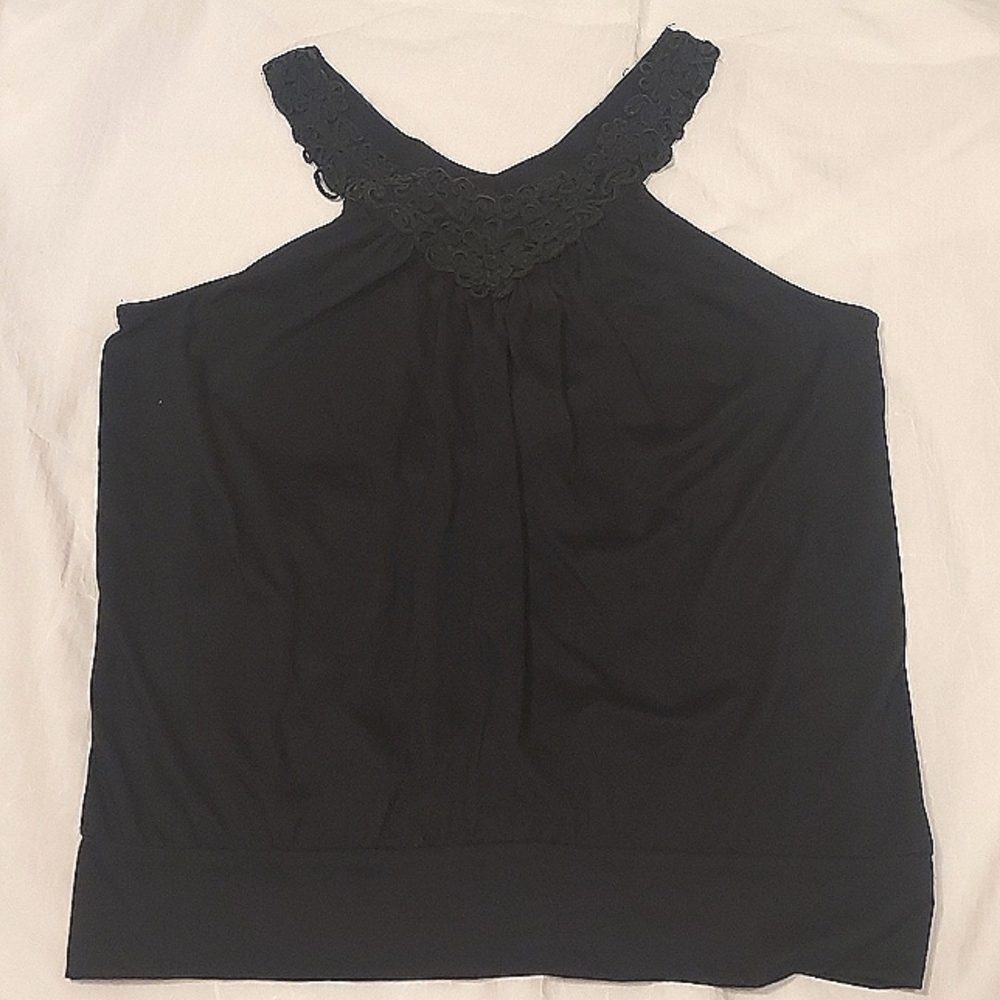 Isabella Rodriguez sleeveless black top